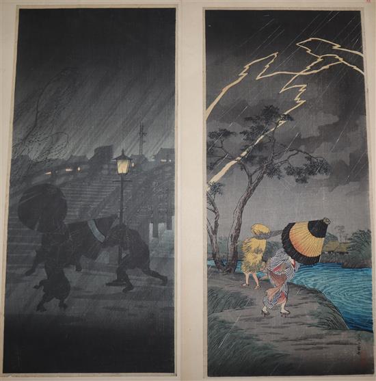 Japanese School, pair of woodblock prints, Travellers in stormy weather, 38 x 17cm, unframed